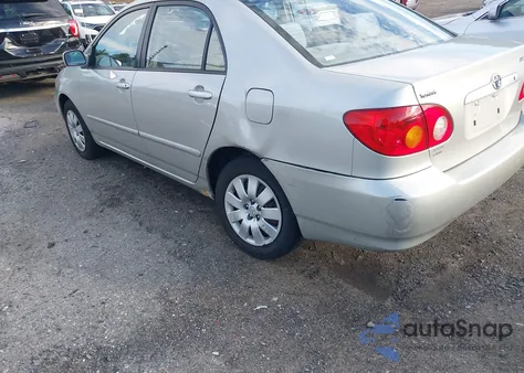 2004 Toyota Corolla Le z USA, uszkodzony, nr VIN 2T1BR38E14C258944